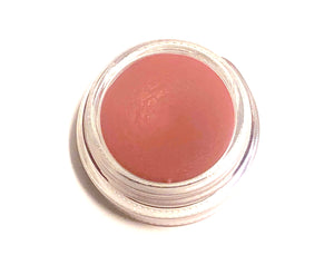 Solomé Beauty’s Lip & Cheek Tint in Rose, a delicate, rosy pink shade in a chic, reusable glass jar for a soft, romantic touch.